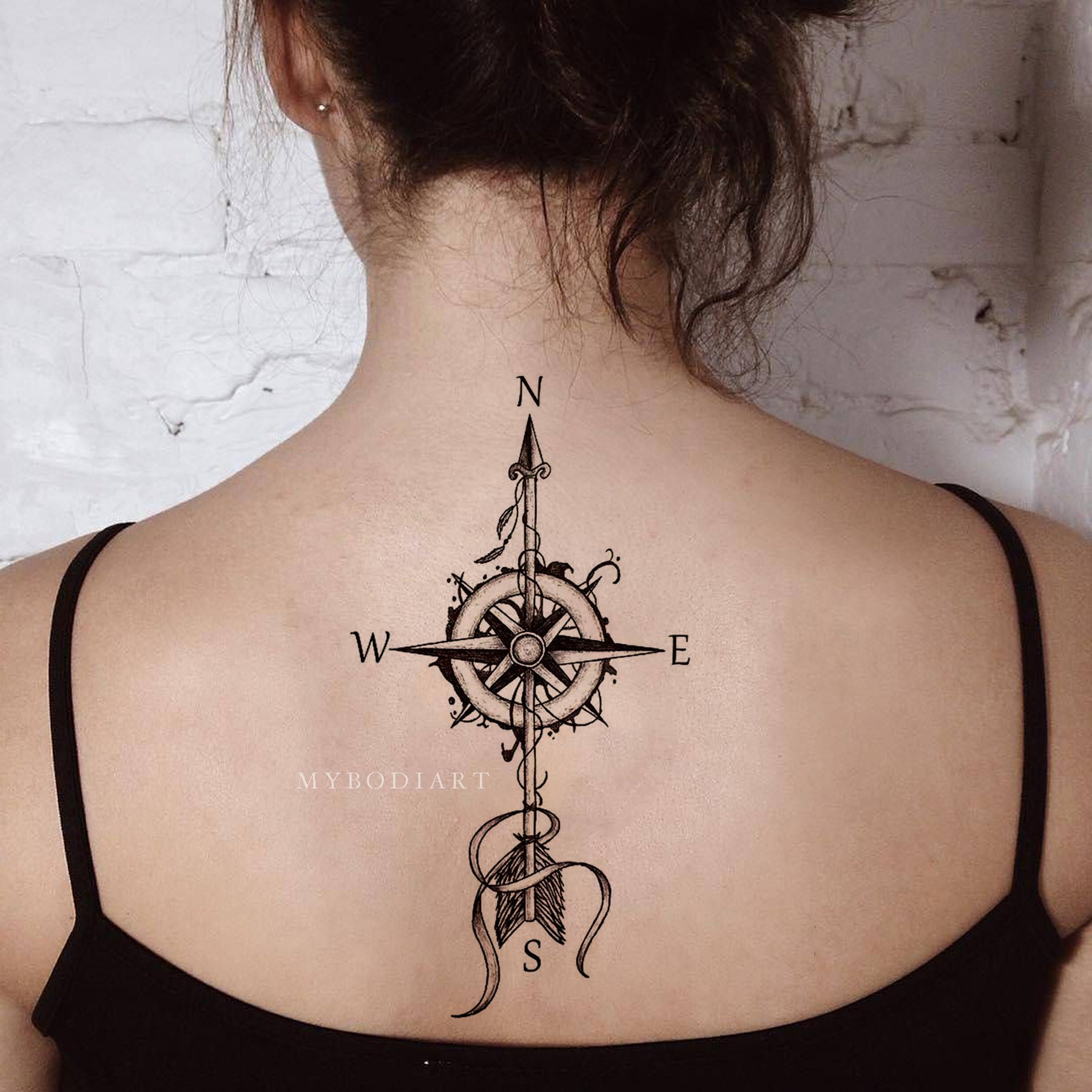 Arrow Upper back tattoos for females