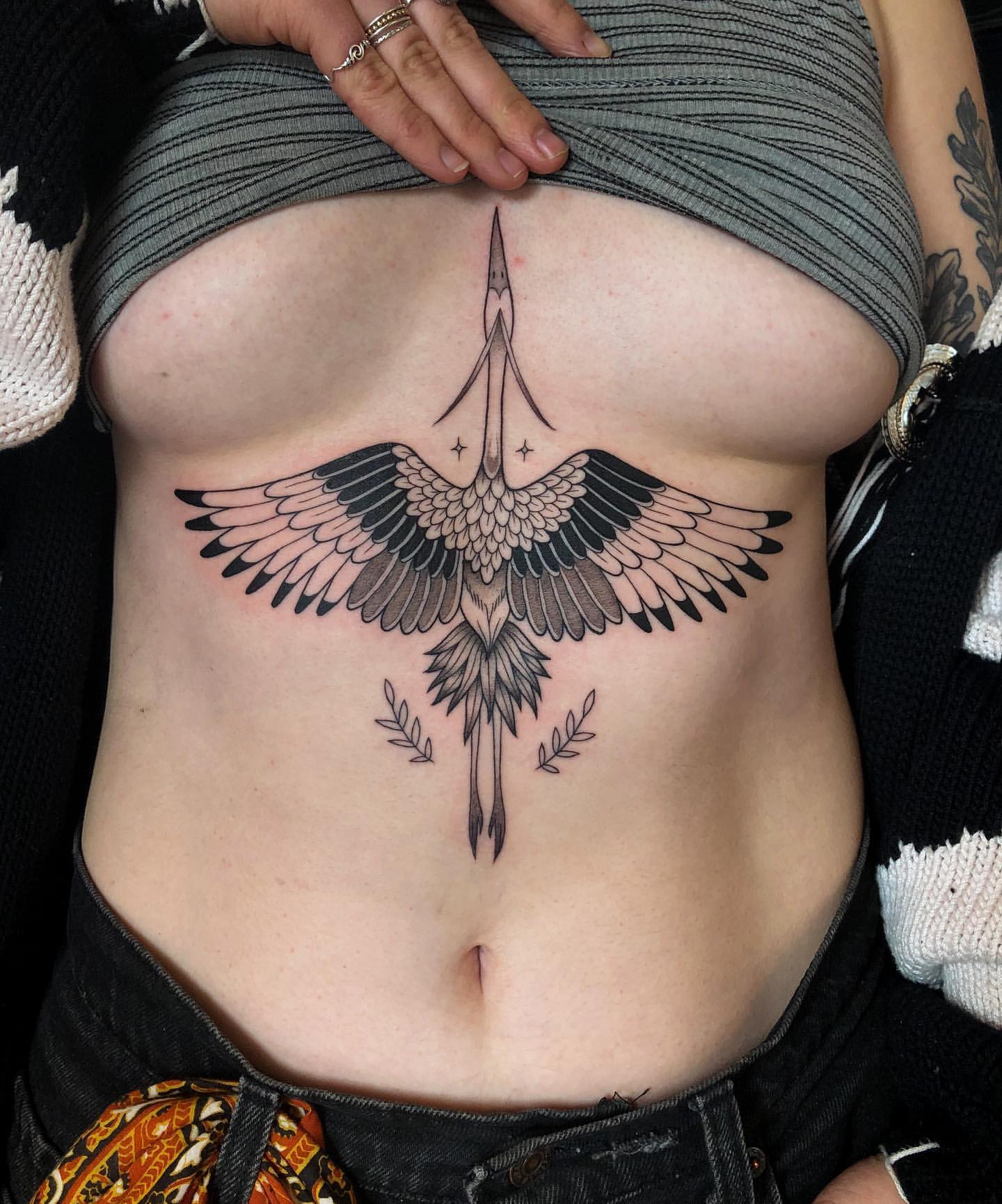 Sternum Tattoo Design